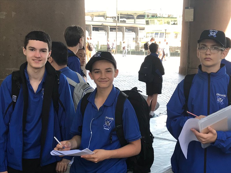 Angus Wines, Lachlan Campbell and Charlie Freeman completing a pedestrian count in Circular Quay