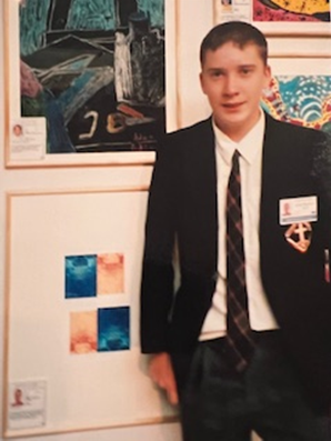 Jacob, Isabella's Dad, with his artwork on display at the Art Gallery of NSW when he was in Year 8