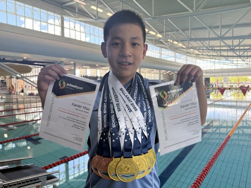 Congratulations, Xavier! Swimming in Gold!