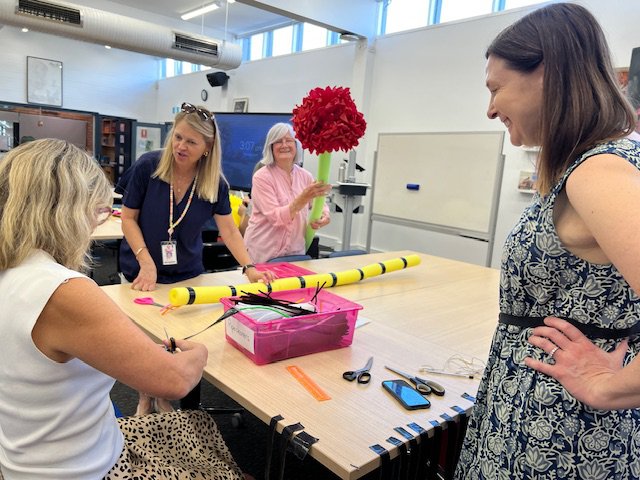 Parents and teachers help create props for our upcoming musical